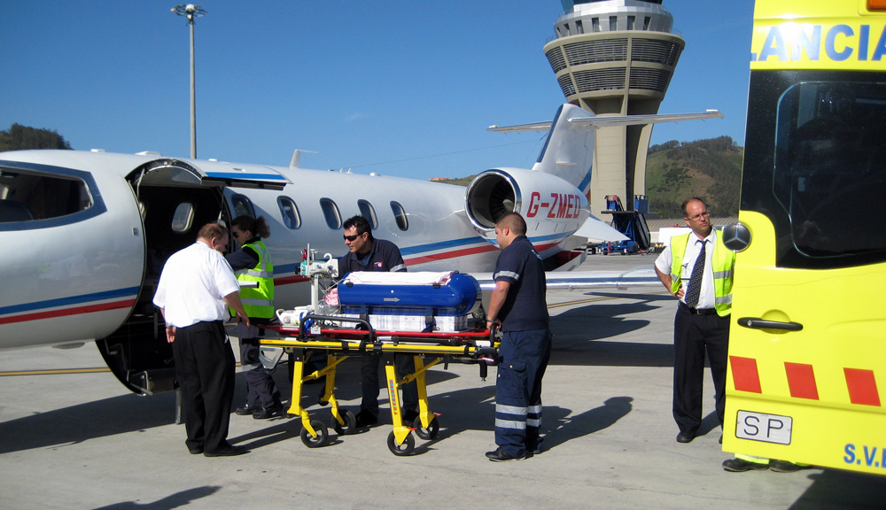 A neonate being transferred from ground ambulance to air ambulance